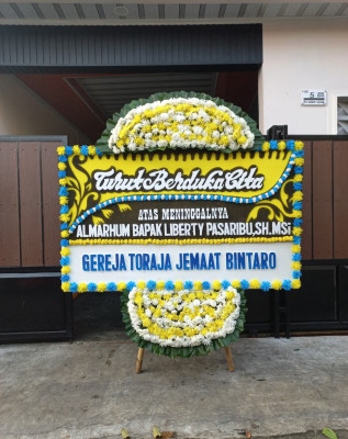 Papan Bunga Duka di Oba Selatan